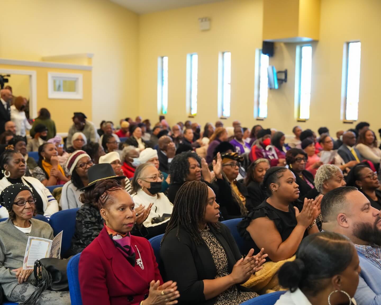 Congregation gathered inside Fellowship Covenant Church